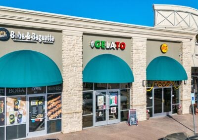 Storefronts for a variety of thriving businesses in the Park Glen Summit shopping center in Fort Worth TX