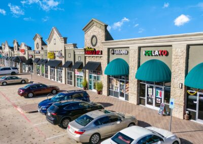 Storefronts for a variety of thriving businesses in the Park Glen Summit shopping center in Fort Worth TX