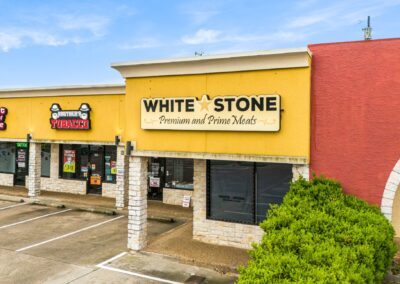 Storefront for White Stone Premium Meats at the Santa Fe Shopping Center in Weatherford TX
