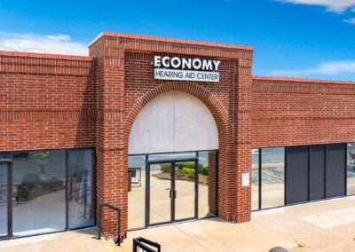 the brick entrance to Economy Hearing Aid Center at Heritage Plaza in Midwest City OK