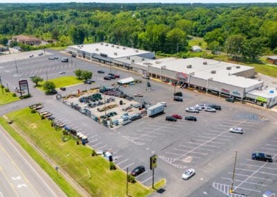 Aerial view of the Bonner's Point Shopping Center in Roanoke AL with prominent signage along the main road
