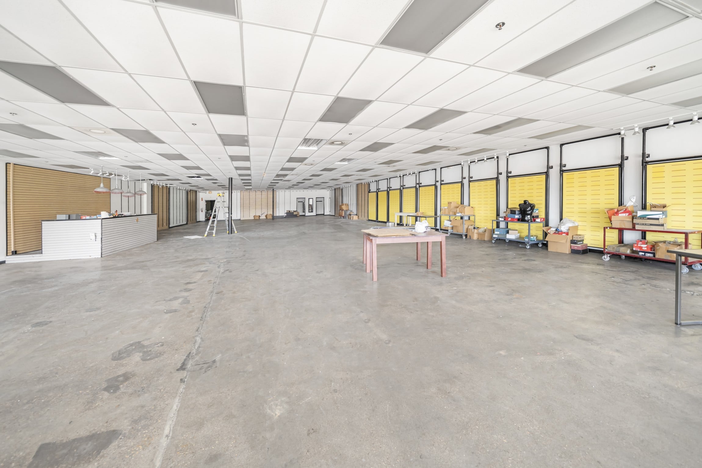 the empty retail floor of Suite 6554 at Hickory Commons, with polished concrete floors