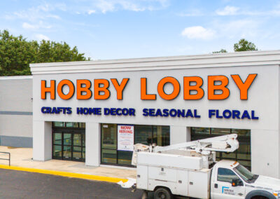 Storefront of the new Hobby Lobby in Marion NC, with a utility truck parked out front