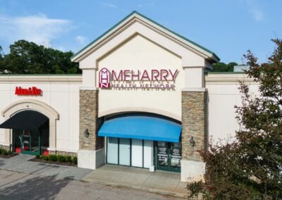 storefront for the new Meharry Health Network medical facility with trees out front, in the Shops at Rock Creek shopping center in Cordova TN