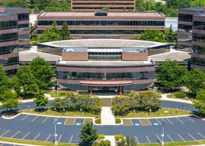 Main entrance of the 4 Overlook Point corporate campus with multiple parking structures and surface lots, a turn-key data center, and over 800k SF of Offices, now available for lease under new ownership!