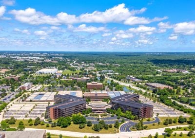 Aerial overview of the 4 Overlook Point corporate campus with multiple parking structures and surface lots, a turn-key data center, and over 800k SF of Offices, now available for lease under new ownership!