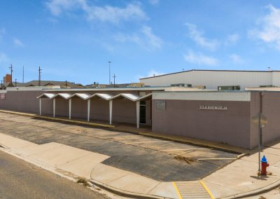 Front entrance of the event space half of the Lubbock Warehouse, a mixed-use property in Lubbock TX now available for lease