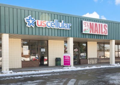 Storefronts of US Cellular and TS Nails in the Greentree Mall shopping center in Berlin WI