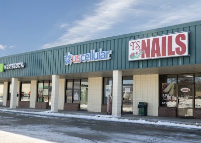 Storefronts of US Cellular and TS Nails in the Greentree Mall shopping center in Berlin WI