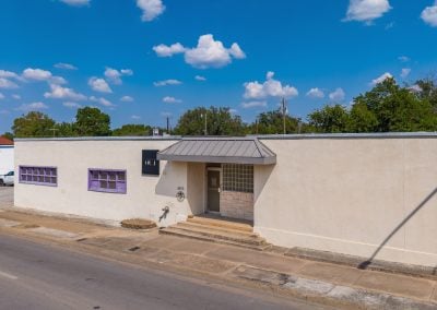 Main entrance of McCart Warehouse, a flex building located at 3605 McCart Ave in Fort Worth TX with flex/office/warehouse space for lease