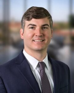 staff photo of Travis Ryffel, President of Woodcrest Capital